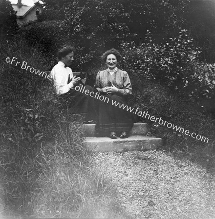 NELL BROWNE WITH A CAULFIELD IN GARDEN OF BISHOP'S HOUSE